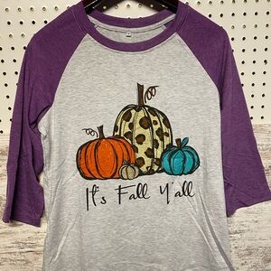 It’s Fall Y’all pumpkin shirt with 3/4 length purple sleeves in size Small.